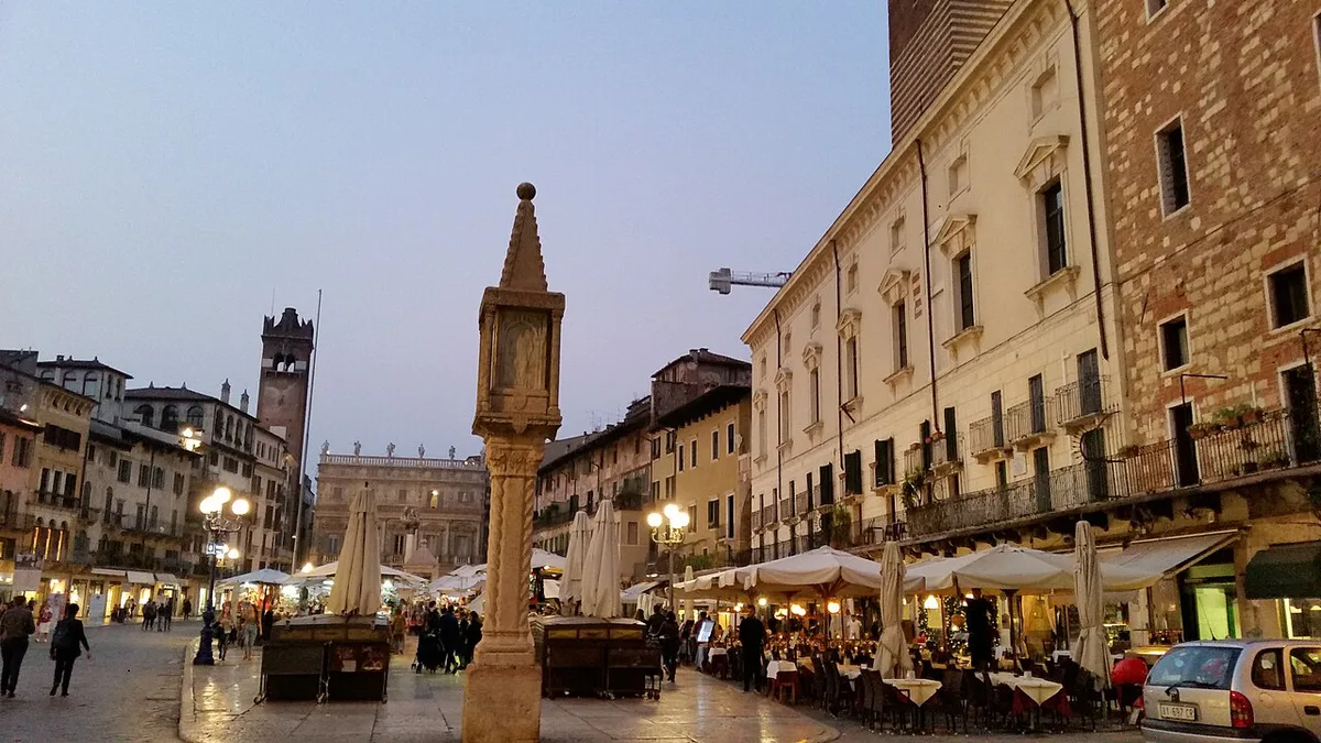 Piazza delle Erbe with the Torre dei Lamberti in the background, Italy — 2